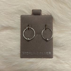 Sterling Silver small hoop earrings with delicate ball. New on original card.